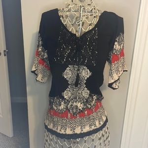 Size medium bohemian top. Angie. Black and red.